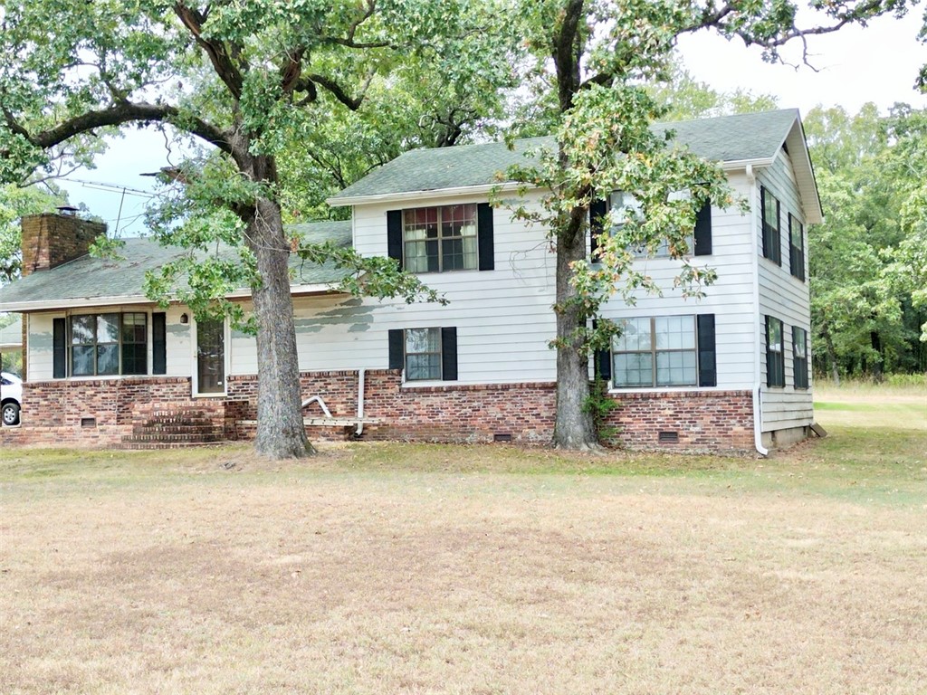 Discover the potential of this spacious 6-bedroom, 3-bath home perched atop Crow Mountain, offering approximately 11 acres of beautiful land. With 3,014 square feet of living space, this property features a large kitchen, a designated office space, and room for everyone. The home is being sold as-is, where-is, giving you the opportunity to add your personal touch and bring out its full charm with some TLC. Whether you’re looking for a private retreat, space for a growing family, or an investment opportunity, this property offers endless possibilities in a scenic location.