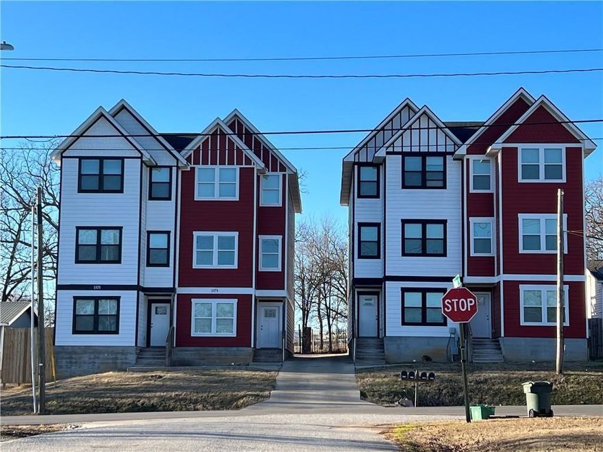 Available July 1, 2026! Ideally located just one block off Razorback Road and within walking distance to Baum Stadium, these upscale townhomes offer 3 bedrooms, 3.5 baths, and approximately 1,800 square feet of thoughtfully designed living space.
Each bedroom features a private en suite bath and spacious walk-in closet, providing both comfort and privacy. The main living level includes an additional half bath for guests, along with an open-concept living and dining area perfect for entertaining. Enjoy top-of-the-line appliances and modern finishes throughout.
Photos shown are of the adjacent townhome, as the property is currently occupied. Agent owned.