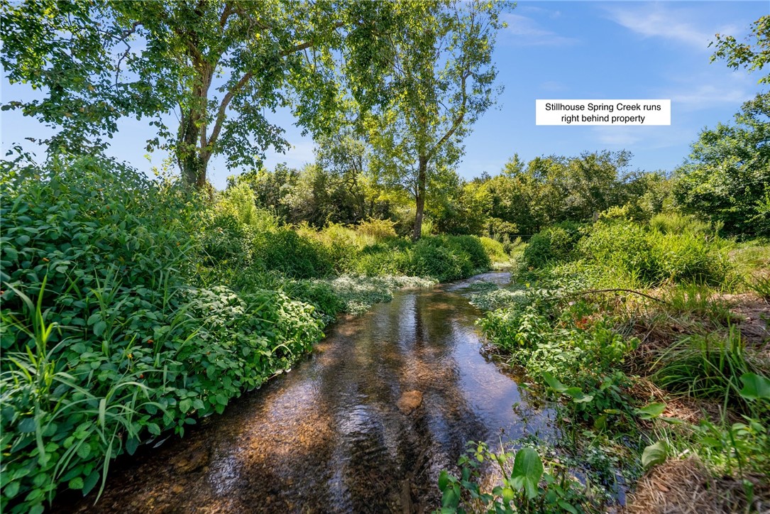 There is absolutely nothing like this neighborhood in all of Northwest Arkansas! This 1.98 ac mostly level property is surrounded by the Arkansas Natural Heritage Preserve and the Stillhouse Spring Creek (not on property but accessible). Set back from the cul-de-sac means privacy in a park like setting perfect for an estate. Public electric, gas, and water. Bentonville schools! Choose your own builder to build your dream home! More information including specifics to this lot, building requirements, and disclosures available.