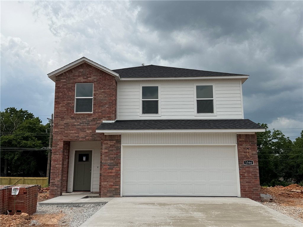 Gorgeous Garfield plan in Nature Walk, located in Springdale! These brand-new homes will have a brick and HardieĀ® siding exterior! This plan offers 4 bedrooms and 2.5 baths! Living room will showcase a beautiful and modern Electric Fireplace with Poplar Mantle and a ceiling fan. This home will have LVP downstairs and Carpet on the stairs and in all upstairs living areas. The kitchen features 36-inch cabinets, lovely appliances and quartz countertops and tile backsplash. The primary bedroom has a fabulous ensuite, dual sinks, with a walk-in shower with tiled walls. LED lighting throughout. High efficiency AC with programmable Wi-Fi thermostat. Front, side, and PARTIAL back sod for the larger lots. Come find your dream home today! Taxes and Parcel TBD. Garage Door Opener!