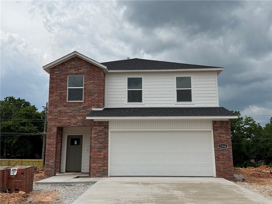 Gorgeous Garfield plan in Nature Walk, located in Springdale! These brand-new homes will have a brick and Hardie® siding exterior! This plan offers 4 bedrooms and 2.5 baths! Living room will showcase a beautiful and modern Electric Fireplace with Poplar Mantle and a ceiling fan. This home will have LVP downstairs and Carpet on the stairs and in all upstairs living areas. The kitchen features 36-inch cabinets, lovely appliances and quartz countertops and tile backsplash. The primary bedroom has a fabulous ensuite, dual sinks, with a walk-in shower with tiled walls. LED lighting throughout. High efficiency AC with programmable Wi-Fi thermostat. Front, side, and PARTIAL back sod for the larger lots. Come find your dream home today! Taxes and Parcel TBD. Garage Door Opener!