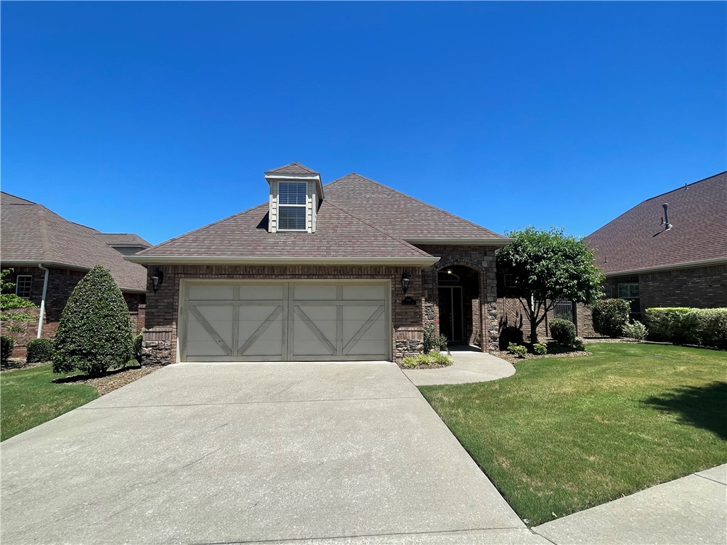 Spacious 5 bedroom/3.5 bath Patio Home in the established Cross Creek Subdivision near schools, 1-49, Pinnacle Hills area, and lots of restaurants. Neighborhood amenities include trails, pool, and playground. Enjoy your ease of living here with maintained yard and lawn care, and enjoy your patio each evening! This home comes with washer, dryer, and refrigerator. Schedule a showing to see it today!