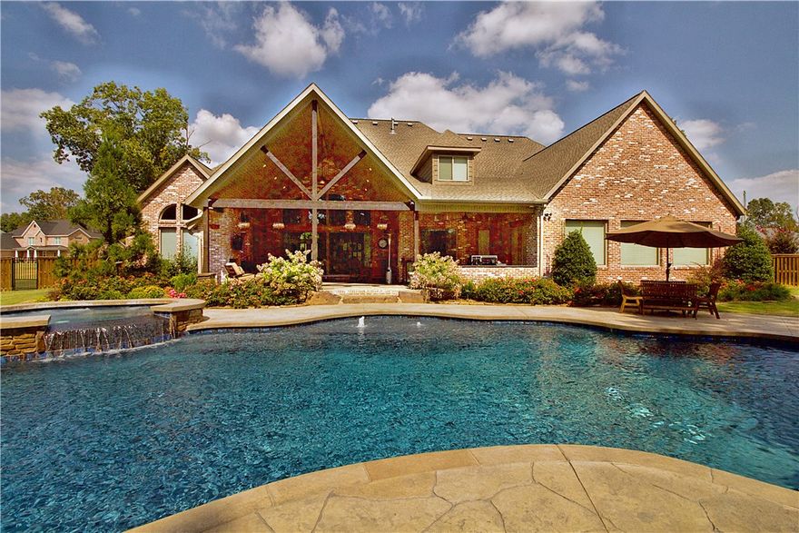 Resort style pool and backyard area, private grata waterfall, the real deal man cave with audio and hook ups for 3 wall mount tv's. amazing office, butlers pantry, mudroom, laundry room and hobby room, 4 car garage, custom light fixture package. hot tub, outdoor kitchen and living room, with wood burning fireplace, large fenced in area with room to grow...and hunt if you like that sort of thing ;);) TV's and media equipment do not convey.