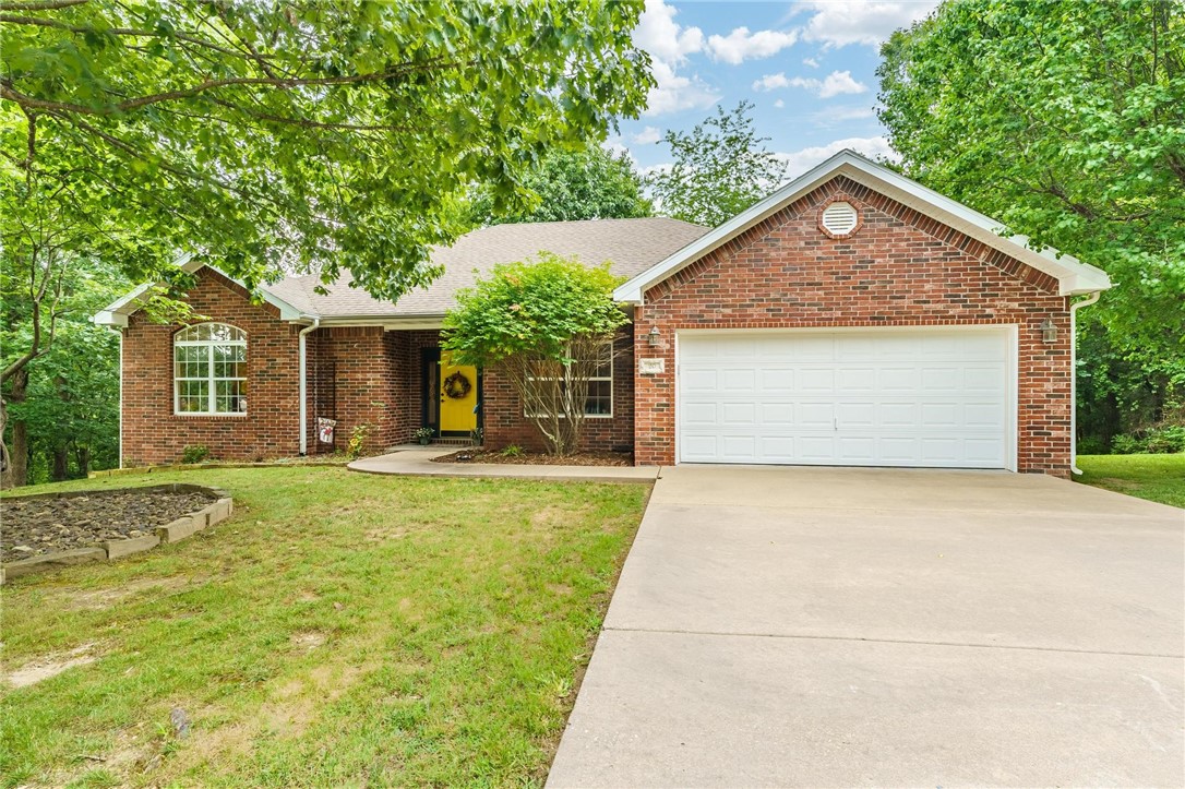 Custom built home with upgrades and extras. 3br. 2 full baths, den/office. Walk into an open vaulted home with rounded corners and coffered ceilings. Pleasing decorator colors have been tastefully added. The large well-appointed kitchen features a large built-in china cabinet. Custom counters,backsplash,under counter lighting, and a large sink. All appliances will stay. The bedrooms are roomy with large closets. Bonus room den/office with wainscoting. You will never want to leave the large covered patio,enjoying the wildlife and tranquil setting. Located in a cul-de-sac with quick access to Hwy. 71 (15 minutes to Bentonville) back 40 trail system,blowing springs greenway,Cooper elementary.fire station,Mercy emergency,2 rec centers. Move-in condition.