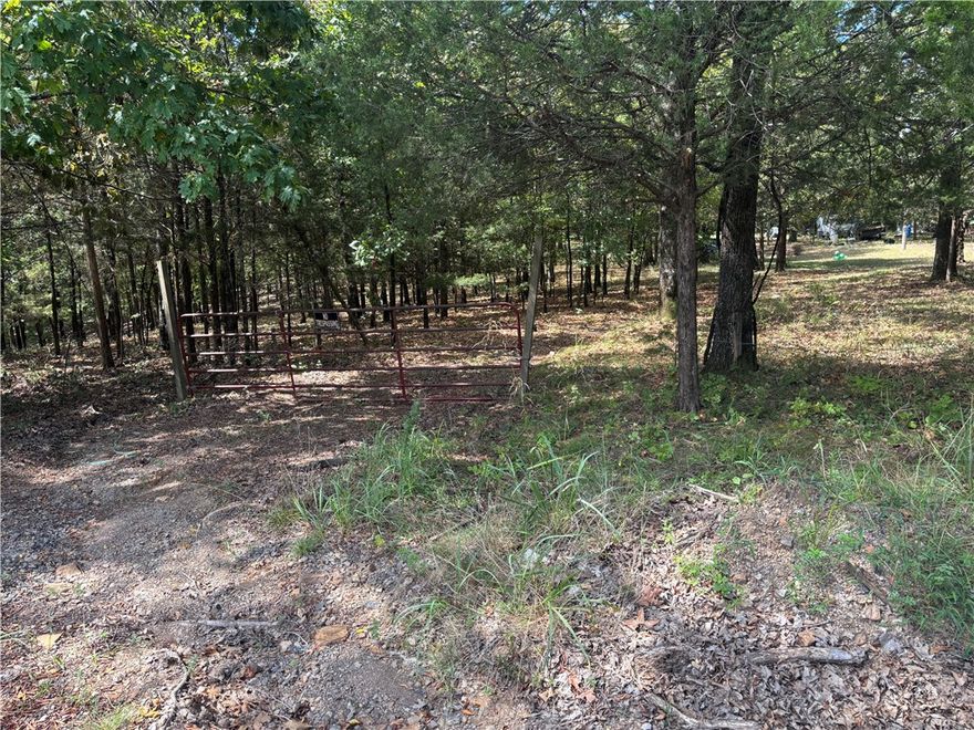 Discover 9.41 scenic acres just north of Rudy, nestled in the heart of northern Crawford County. This picturesque property offers multiple ideal building sites, making it the perfect canvas for your dream home. Whether you're looking to create a peaceful retreat or a forever home, this land provides the space and potential to bring your vision to life.