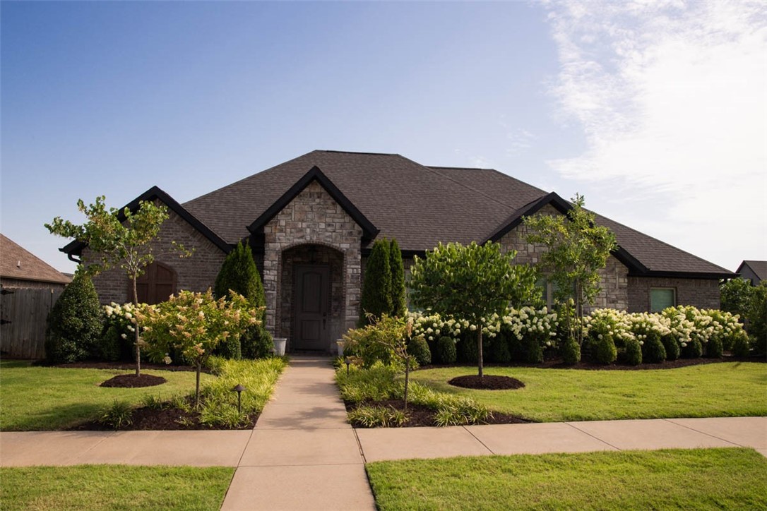 2018 home in immaculate condition with upgrades galore! Upgraded granite, designer lighting and glass tile throughout. Central vacuum. Gas stove top, gas log fireplace, and gas hookup for patio grill. Crown molding. Toilets with bidet seats in primary and powder baths. Built-ins in office and mudroom. Large laundry room. 3 car garage with epoxy floor, shower, and mount for tv. Lush professional landscaping with irrigation and French drains in the front and back yard. 6-foot cedar privacy fence with a 12-foot swing gate and concrete pad for a boat or other. Garden shed conveys. Patio with outdoor television. Beautiful community pool.