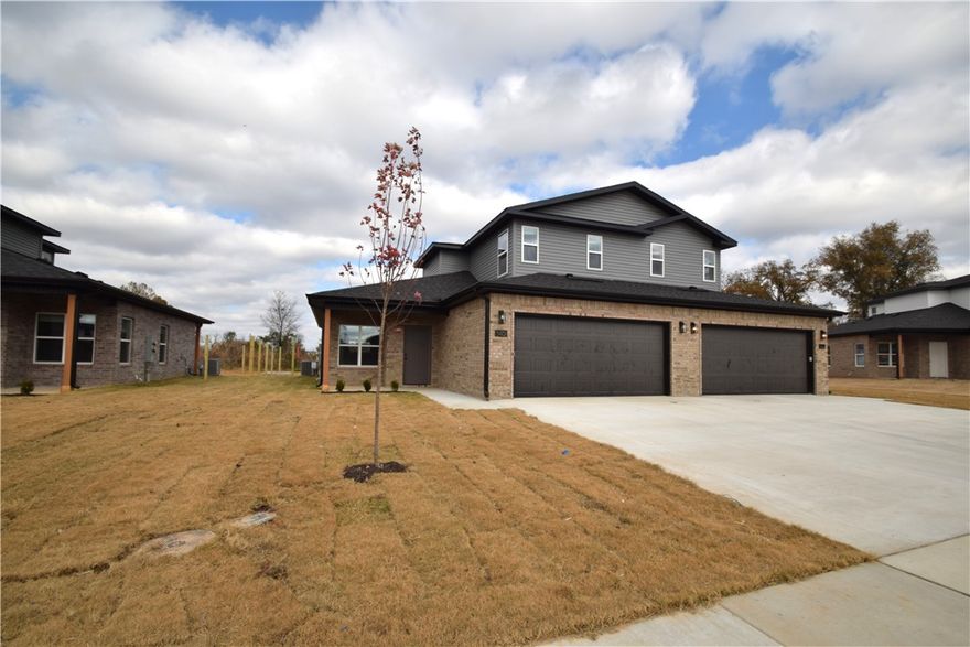 Move in Special $500.00 off of December's rent! Brand new and ready to move in! Come see this beautiful newly constructed 3-bedroom, 2.5 bath duplex. The home features luxury vinyl plank flooring throughout the main and common areas and the upstairs bedrooms. The open-concept floor plan includes a stylish kitchen with granite countertops and stainless steel appliances. All major appliances provided, including washer and dryer. Enjoy the convenience of a 2-car garage with EV charging capability and a private backyard perfect for entertaining or relaxing. Tenants are responsible for utilities and lawn care. No smoking. Pets negotiable with owner approval and additional deposit.