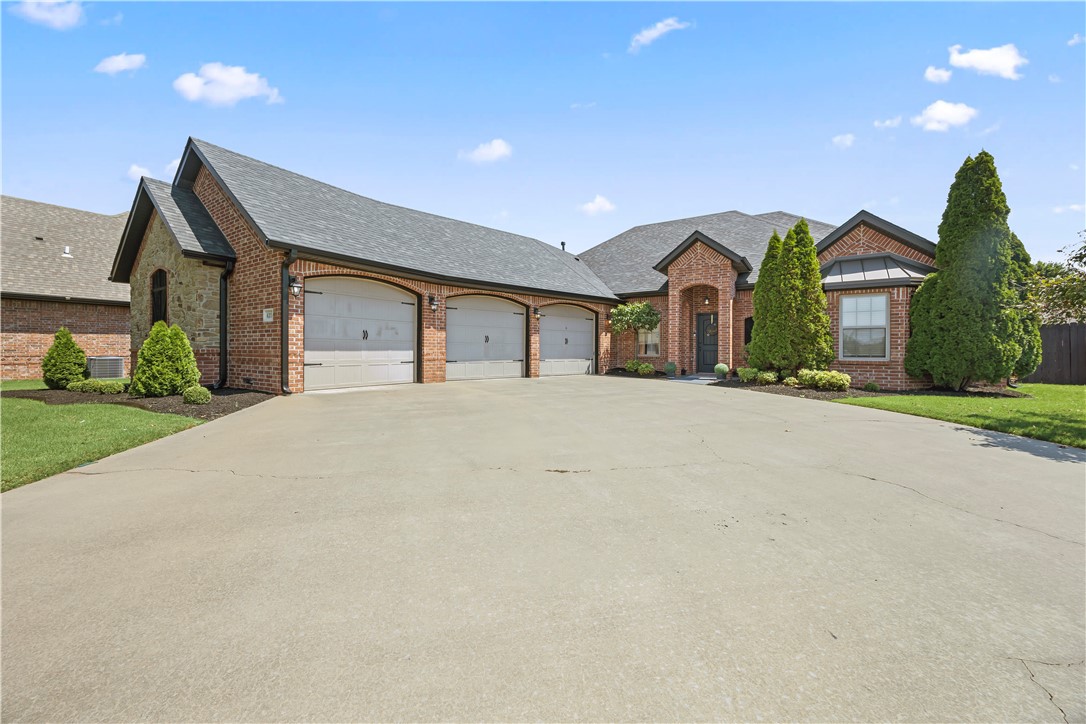 Welcome to this beautiful home—where style, comfort, and convenience come together in one of Bentonville’s most desirable neighborhoods! This 4-bed, 3-bath residence is beautifully maintained and thoughtfully designed, just minutes from Bentonville Schools, Creekside Park, and scenic biking and walking trails. Step inside to find a light-filled, open layout that balances relaxed living with spaces perfect for entertaining. The backyard is a true showstopper, featuring a spacious, level lawn, an extended paved patio, and a natural gas hookup ready for your dream outdoor kitchen or barbecue. Whether it’s summer cookouts or peaceful fall evenings, this private retreat is built for year-round enjoyment. With a community pool and amenities just steps away, this move-in-ready home delivers the perfect blend of prime location, thoughtful upgrades, and everyday luxury. With Downtown Bentonville, the Walmart Home Office, and 8th Street Market nearby, you’ll enjoy dining, shopping, and essentials right at your doorstep.