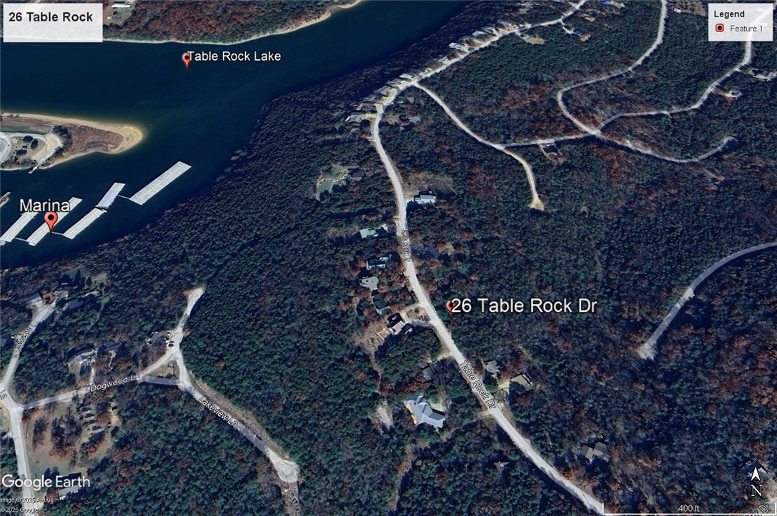 Ready to build your dream home? Nestled in a gently wooded area with a picturesque community feel, this large lot offers the best of both worlds. Enjoy the amenities in Holiday Island like golf courses, a country club, swimming, tennis and a marina with a fishing dock or watch the local fauna from your front porch! Nearby Eureka Springs or Rogers offers great shopping and vibrant cultural hubs.
