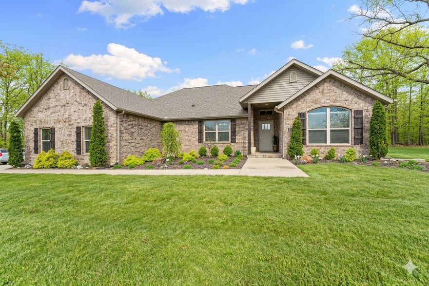 Experience this like-new construction, perfectly situated on a rare level lot. Located just minutes from Loch Lomond, Highlands Golf Course & the Tiree boat ramp, this home is designed for those who value both recreation & high-end comfort. The seamless flow begins with a light-filled, open-concept floor plan anchored by stunning hardwood flooring. At the heart of the home, the gourmet kitchen features a spacious double island, granite countertops, bar seating, & a walk-in pantry with an eat-in area. Versatility is key, with flex spaces including a dedicated office or 3RD OPTIONAL BEDROOM & a dining room that easily transitions into a 2nd living area. The primary retreat has a double vanity, custom-tiled walk-in shower & a deep soaking tub. For ultimate convenience, the primary walk-in closet connects directly to the laundry room. Outside, the side-entry garage maintains curb appeal, while the fully landscaped yard features added trees for privacy & a storage shed that conveys. Wired for Starlink.