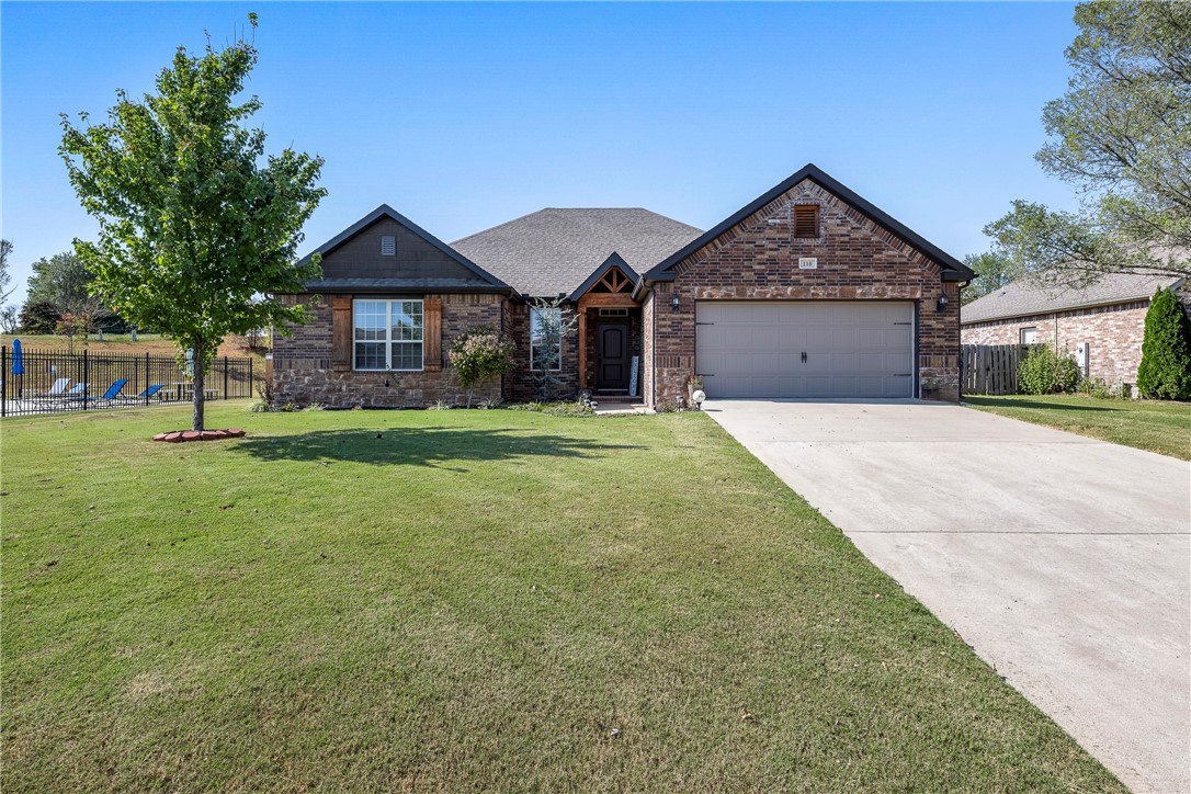 Welcome to Weatherton! Conveniently located in the middle of NWA, this spacious 4-bedroom, 2-bathroom residence features a desirable split floor plan, offering privacy and comfort for everyone. The heart of the home boasts a bright and open living area, perfect for gatherings or cozy evenings in. The eat-in kitchen includes modern appliances, ample storage, and a convenient breakfast bar, making it a joy to cook and entertain. The primary suite is a true retreat, complete with a private bathroom and a large closet that connects to the laundry room, adding ease and functionality to your daily routine. Three additional bedrooms provide plenty of space for family, guests, or a home office. Step outside to enjoy the community amenities, including a sparkling neighborhood pool and a playground just a short stroll away.
Enjoy the proximity to schools, shopping, and dining options as well as easy access to the airport for those getaways and business trips. Book your showing today!