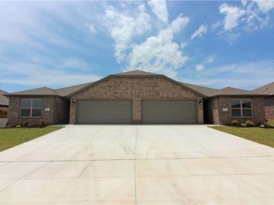 Newer duplex in great location! Close to the Wal-Mart Neighborhood Market on Hwy 102 and Greenhouse Rd in Bentonville, 3 bedroom split plan, 2 baths, open living space, wood look tile in main living space and carpet in the bedrooms. Kitchen has gas range, granite and pantry. Refrigerator provided. Wood privacy fence back yard. No smoking. Pets negotiable with owner approval.