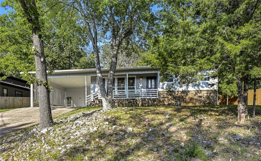 Walking distance to Lake Avalon & Avalon Beach (.06 mile)!  Close to trails!  This would make a wonderful Home Sweet Home or a great investment as rental property.  Fully remodeled two years ago including NEW roof; HVAC; windows; insulation; luxury vinyl plank flooring throughout (sub floor was replaced); new electrical outlets and switches; bathrooms with new toilets, fixtures, hardware, stone countertops, bathtub, tiled showers; kitchen with new cabinets, sink, fixtures, hardware, stone countertops, stainless appliances. Septic pumped 2 years ago.  A large room with lots of windows at the back of the house provides a wonderful option for extra living space, office, game room, sunroom, etc.  The back yard privacy fence has an extra-wide gate that would allow a boat, trailer, storage building or other large items.  All appliances convey except the washer and dryer.  The two-vehicle carport has a storage room (7.5' x 13'). Storage building & firepit convey. Carport length 19'6" and height 11'2" with 10' at entrance.