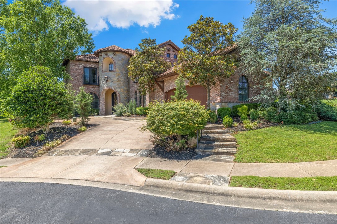 Magnificent Tuscan-inspired, custom-built home nestled on a quiet cut-de-sac on the patio side of the Blessings Golf Community. This home boasts Canadian white pine solid beams, venetian plaster covered walls, cast stone fireplace in the living room and custom lighting throughout. The primary bedroom with en-suite bathroom are on the lower level tucked away in their own tranquil space. The curved wooden staircase takes you upstairs to three bedrooms and an amazingly designed media/theatre/game room. Retreat to the outdoor patio with waterfall and fireplace for luxurious outdoor living.
All new flooring through out home and freshly painted
