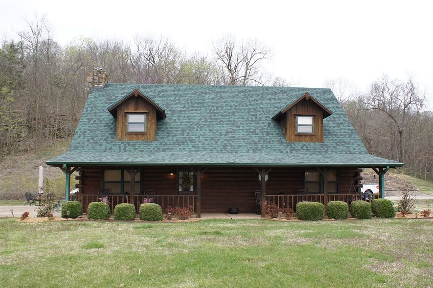 Conveniently located 25± miles west of Bentonville consisting of 150± acres (to be determined by final survey) with a custom log cabin overlooking a private, spring fed lake. Over the past 15 years, the current owners have cut trails, planted trees, and executed a wildlife management plan making the ranch a premier property for outdoor enthusiasts. Given its proximity to Bentonville, this property is just a short drive to enjoy the amenities and entertainment that abound in Northwest Arkansas but far enough removed to relax and enjoy a peaceful country experience. After a long day enjoying the outdoors, you can retreat back to the front porch of the log home and relax to the stunning views the property has to offer.
Also listed as MLS #1179958, #1179979 and #1179987.