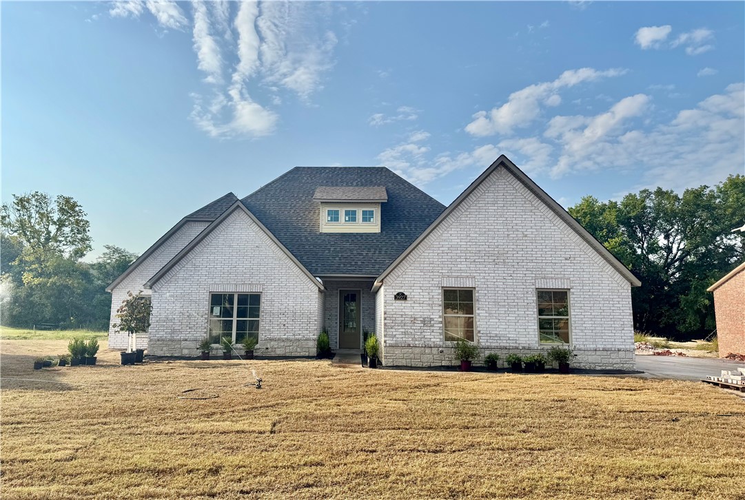 Welcome to this beautiful two-story home offering 4 bedrooms, 3.5 bathrooms, and an ideal layout for both everyday living and entertaining. Step inside to find an inviting open floor plan that seamlessly connects the kitchen, dining area, and living room. The kitchen features a large island—perfect for hosting family and friends—along with plenty of cabinet space.
Enjoy cozy evenings by the fireplace or get some work done in the dedicated study. The primary suite is a true retreat, complete with a beautiful master bathroom with connected his and hers closets. Upstairs, you'll find a large bonus room perfect for a media space, playroom, or additional living area, plus extra storage room.
Outside, relax on the covered porch and enjoy the comfort of a 3-car garage for all your vehicles and gear. This home blends function, comfort, and charm—don’t miss your chance to see it!
Please note: Lot line adjustment is in progress.
