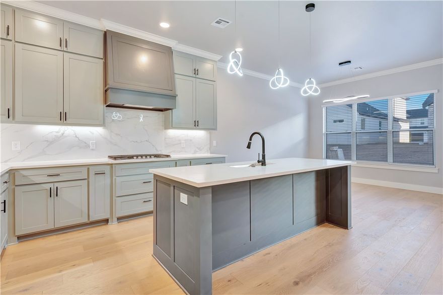 Location matters, and this one delivers! 1851 Lotus Road is in Silver Leaf Estates, a growing community zoned to Bentonville Schools with access to a clubhouse, pool, fitness room, walking trails, pond, and dog park. Three bedrooms on the main level include a private primary suite set apart for added privacy. The living room has custom built ins and a gas fireplace and opens to the kitchen with quartz counters, custom cabinetry,  large island, pantry, and designer lighting. The primary suite offers a spa style bath with walk in shower, large tub, and oversized closet. Upstairs, a large bonus room, additional bedroom, and full bath provide flexible space. Convenient location less than 20 minutes to Downtown Bentonville and new Walmart Home Office, and under 15 minutes to XNA. Up to $5,000 is also available toward closing costs, prepaid items, or a rate buydown with preferred lender financing. Privacy fence to be installed soon!