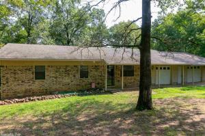 Come see this ranch style home on a BEAUTIFUL 1 1/2 acre lot, extra large garage, large utility room, wood floors, nice new deck, new HVAC in 2018, storage building. Only 3 miles North of I-40- MUST SEE! Country living but very close to town.
