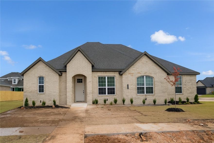 As Pea Ridge grows into one of Northwest Arkansas’s most sought-after areas, Concord stands out as the ideal neighborhood to plant your roots. Welcome to the 2,335 sq. ft. Plan! This beautiful home offers 4 bedrooms and 2.5 bathrooms, along with a side-load 3-car garage that enhances its curb appeal. Just off the garage, you’ll find a mudroom that conveniently connects to the utility room — perfect for busy households.The open-concept living, dining, and kitchen area creates a spacious yet welcoming feel, ideal for entertaining or relaxing with family. A half bath off the kitchen and dining area adds convenience for guests.The primary suite is thoughtfully separated from the other bedrooms by the main living area, providing a sense of privacy and tranquility. Inside, you’ll enjoy beautiful granite countertops throughout, luxury vinyl plank flooring in the main living areas and cozy carpeted bedrooms. Step outside to your covered back patio and fully fenced backyard, offering the perfect space to entertain outdoors.