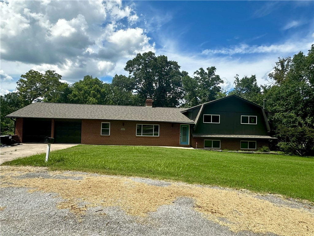 Calling all investors or a handy family for this big family home with great bones, just needs a new facelift. Sitting at the back of a private cul-de-sac on almost 2 acres of land is this unique home. Home features a a double sided fireplace in the living room that has an additional sitting area as well. The big open kitchen has a butcher block counter, tons of cabinets and an additional room off kitchen that leads to garage and backyard. The other side of the double sided fireplace will heat your dining area off kitchen while you eat. This tri level home has a room which could be another primary, as it has an ensuite, and a second living area downstairs that could be a flex room. On the top level is three more bedrooms, two kids rooms that would share a bathroom, and the primary with ensuite. Your whole family will be comfortable as they can spread out in this big family home...and a pool was started, it just needs to be finished out back. New roof, gutters, windows, exterior doors and paint in December of 2019.