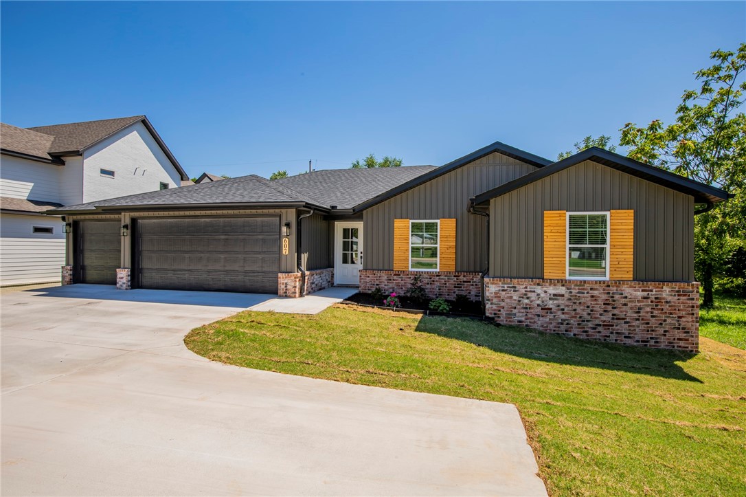 $5000 in Buyer Incentives being given by the Seller!!! GORGEOUS New Construction home close to everything in Downtown Gravette. The natural light pours in through the spacious living room. Beautiful, open kitchen with a large island for entertaining. Split floor plan with a spacious primary suite and bathroom with free standing tub, custom tile shower, and walk-in closet that leads to the laundry room. Half bath close to the entry for guests. Custom cabinetry and woodwork with a mixture of Quartz and Granite countertops throughout the home. Beautiful modern light fixtures and cabinet hardware. Smart thermostat for energy efficiency. The exterior has a Ring Doorbell, custom cedar shutters, covered deck, & attached 3 car garage. Enjoy evenings in your fenced in backyard.