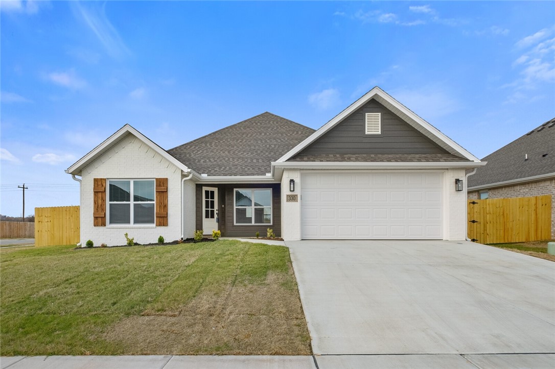 Experience comfort and style in this wonderful new build rental located in a brand-new Centerton neighborhood! This beautifully designed 4-bedroom, 2-bath home offers a split floor plan for added privacy and a cozy gas-log fireplace in the living room. The kitchen features stainless steel appliances, including a gas range and refrigerator. The backyard offers a fully sodded yard with a wooden privacy fence. Washer and dryer are also included. Background check, credit check, and renters' insurance are required. Minimum one year lease term.