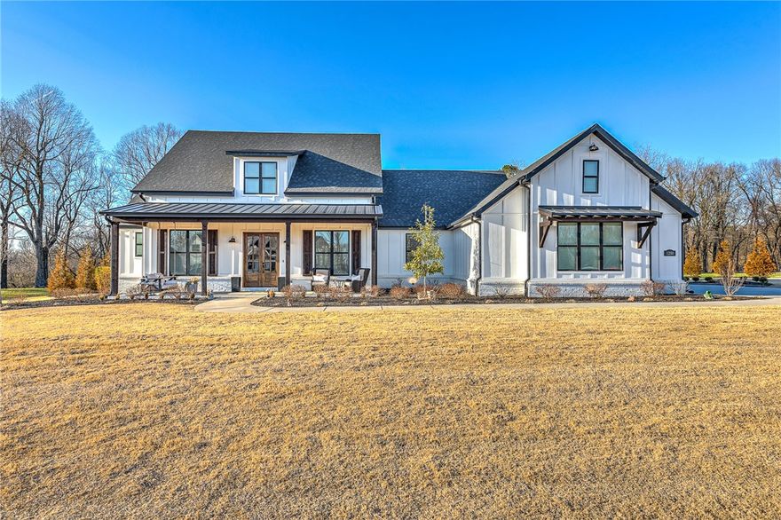 Welcome to your dream home! This stunning 4 bedroom, 2.5 bath custom modern farmhouse with a pool is situated on over 2 acre of beautifully landscaped property. The open concept living space features high ceilings, natural light, and a spacious layout that is perfect for entertaining. The gourmet kitchen boasts top-of-the-line appliances, custom cabinetry, and a large island with plenty of seating. The adjacent dining area and living room provide ample space for hosting dinner parties or relaxing with family and friends. Step outside and be transported to your own private oasis. The sparkling pool is surrounded by a large patio, perfect for lounging and soaking up the sun. The expansive backyard offers plenty of space for outdoor activities and even features a charming garden area. This property offers privacy, tranquility, and the perfect balance of indoor and outdoor living. With its luxurious amenities, custom finishes, and modern farmhouse design. Don't miss your chance to make this your forever home!