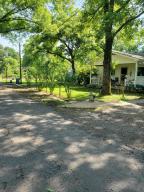 Motivated sellers!! 5 bed/ 2 bath home. 1905 square foot M/L. West Side School district. Coal Hill city limits. This home has huge potential with room to grow. Plenty of room for your growing family. Shed in the back of the property has been converted to 2 different living quarters. Nice quiet neighborhood. This property is on a double lot.
