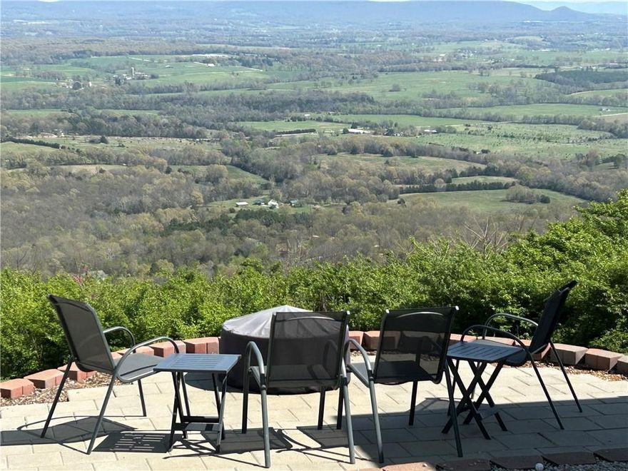 Set along beautiful scenic Orchard Point Road, this fully updated all-brick 3-bedroom, 2-bath home offers breathtaking valley views and peaceful Ozarks living at its finest. From the backyard, you’ll enjoy stunning panoramic scenery that makes every sunrise and sunset unforgettable.  Designed for both comfort and efficiency, the home features an 8KW solar system for eco-friendly living and lower utility costs. Inside, you’ll find stylish updates throughout with a warm, modern feel, along with quality finishes that make this home truly move-in ready. Additional features include a custom wine cellar, perfect for added character and entertaining space.
With incredible views, modern upgrades, and a serene setting, perfect for a forever home located close to Buffalo National River, Parks and Trails.