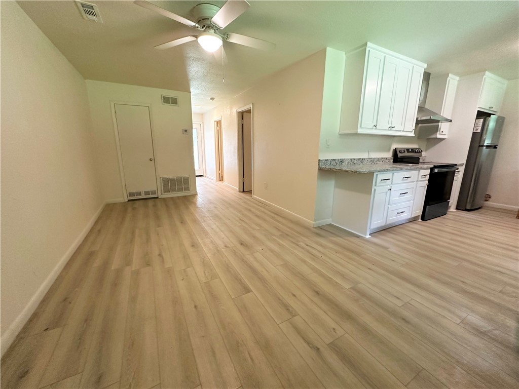 Freshly remodeled 2 bedroom, 1 bathroom, 800sf apartment located in a quiet, peaceful neighborhood at the base of Mt Sequoyah. Brand New LVP flooring throughout, brand new kitchen cabinets/granite counter tops, new appliances (electric range, vent hood, dishwasher), and brand new bathroom vanity/counter/toilet/vent fan-light). New windows, new central Heat & Air, and refrigerator just a couple years ago. This unit is one side of a charming, historic, brick duplex located at the base of Mt Sequoyah, near the historic district, and just a block from the 4 way stop at Mission Blvd and Maple Ave. Washer/dryer hookups (currently has stack washer/dryer). Walking/Biking distance from ONF, Historic District, Dickson St, Downtown Square/ Farmer's market, Wilson Park, UofA, and the Trail system, etc . **Application and current/recent credit report required from all prospective tenants.