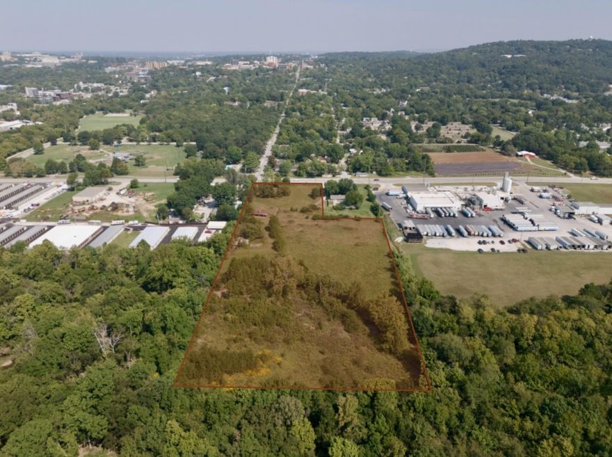 Opportunity zone land located one mile from the Downtown Fayetteville Square and across the street from the newly imagined Walker Park. This commercial and/or residentially zoned land on a high-traffic corridor is prime for development. Recent surveys and appraisal available by request only.