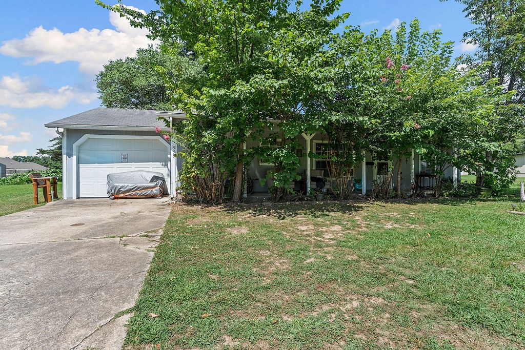 3 bed 2 bath home on a large lot in a great location. The home has been used as a long-term rental so would make a great starter home or an investment property. The 2-car detached garage is finished out to be a mancave or she shed.