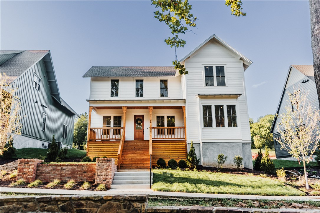 This newly completed home blends timeless design with high-performance construction in one of
Fayetteville’s most distinctive new neighborhoods. Lot 2 offers 2,683 SF with 4 bedrooms and 3.5 baths,
including a main-level owner’s suite, large upstairs flex room, and open living/dining area ideal for
entertaining. Features include white oak floors, quartz countertops, custom soft-close cabinetry, and a
sealed, filtered HVAC system for healthy indoor air. Built to last with Pella Lifestyle windows and high-efficiency insulation, the home is also third-party HERS-rated for energy performance. Native landscaping and a front porch connect seamlessly to wooded streets and trails. Just minutes from the University and Downtown, Markham Hill offers walkability, nature, and long-term
architectural value. Residents also enjoy proximity to The Stonebreaker’s boutique hotel, all-day
restaurant, and neighborhood club.