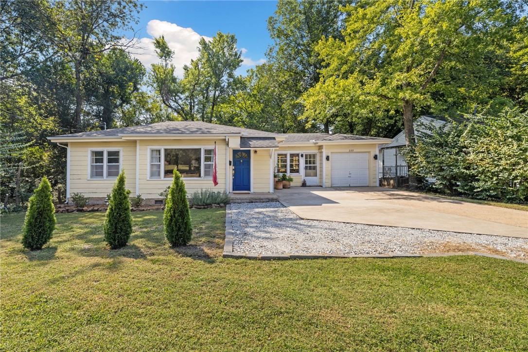Welcome to this 1950ās gem offering 2 bedrooms and 1 bathroom on a .33 acre lot. Wood floors run throughout, paired with built-ins and large windows that fill the home with natural light. Recent updates include a new water heater (2020), HVAC with reworked duct work and intakes (2021), and rewired the home and upgraded the electric (2023). Outside, enjoy a large fenced backyard with patio and a 1-car garage. Conveniently located near Wilson Park, the Razorback Greenway, U of A, UAMS, and downtown Fayettevilleāthis home blends historic charm with modern comfort in a central location.