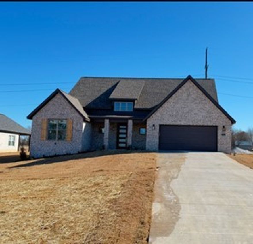 Brand new development in east Tontitown. This plan offers an open concept living area with all bedrooms on main level while upstairs features a large bonus room or 4th bedroom with its own bathroom.  This house also includes soft close cabinet drawers in kitchen and master bath, security system, prewired for surround sound in living room and back patio, an upgraded appliance package, designer lighting package, blinds and gutters. Less than 20 minutes from the Tyson World Headquarters.   Additional concessions include $7500 in closing costs from the builder and up to $5000 from a preferred lender.