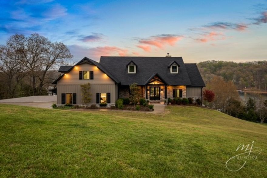 Make everyday a vacation day. Custom home on one of the best coves on Beaver (Big Coose) Lake front property with a wonderful view. This is a one of a kind! Less than 6 years old with open concept, walkout basement, outdoor kitchen, fireplace and gunite pool. Includes 2 slips in a 4 slip dock. Nothing like it on Beaver Lake. In a gated community, just 20 minutes from downtown Rogers.