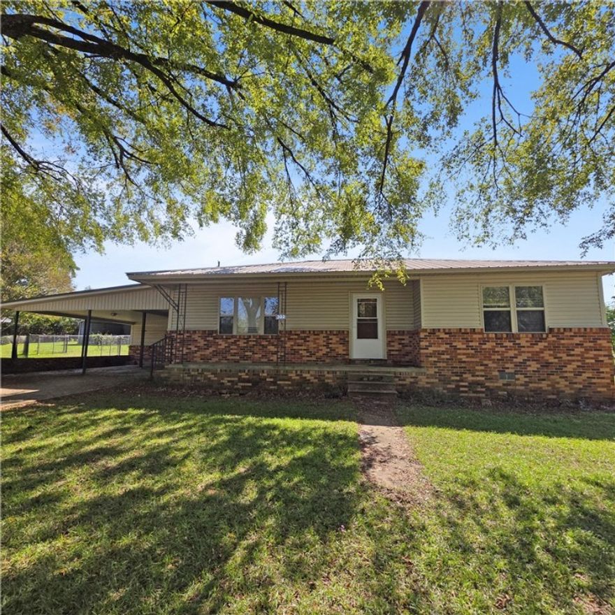 3 bedroom 1 bath home with 2 car attached carport plus a 2 car detached carport. Half acre corner lot offers room for gardening and other outdoor activities. It has a lean to behind attached garage and an outbuilding for storage and hobbies. It has a shaded front porch and front yard. The home has vinyl siding, metal roof, packaged HVAC unit, and newer vinyl windows. All offers to be submitted via Res.net by buyer's agent. Offers will be entertained after property has been exposed on the MLS for 7 calendar days.