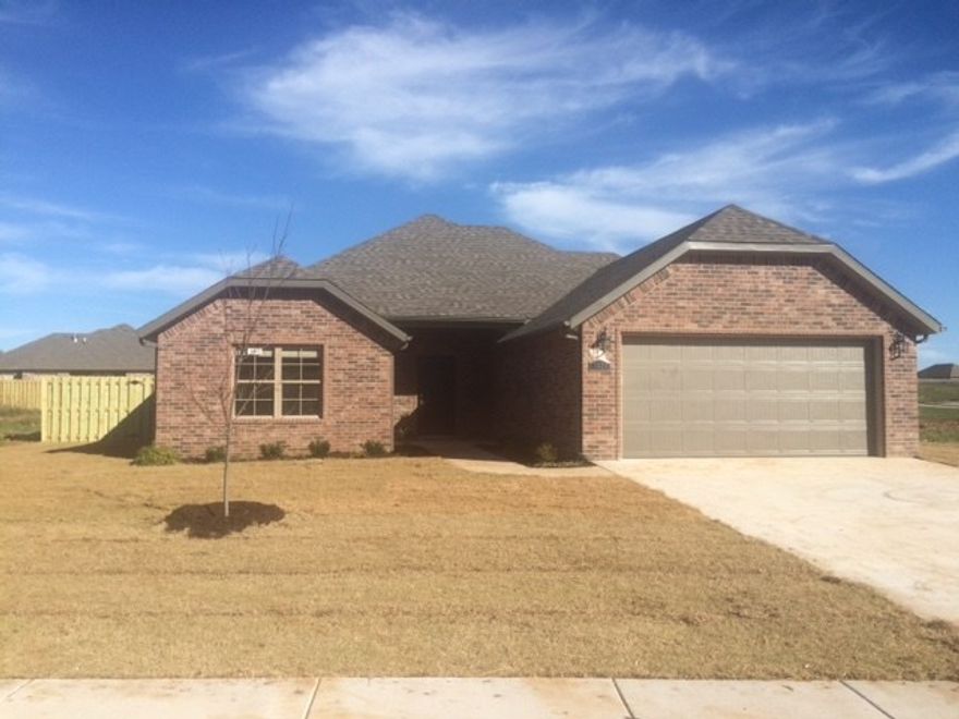 Home was just built in 2014! 4 bedroom 2 bath 2 car garage all brick home. This home has a gas log fireplace, tiled shower, jacuzzi tub, and an open split floor plan. Stainless steal appliances, but no washer and dryer. 6ft PR fence.