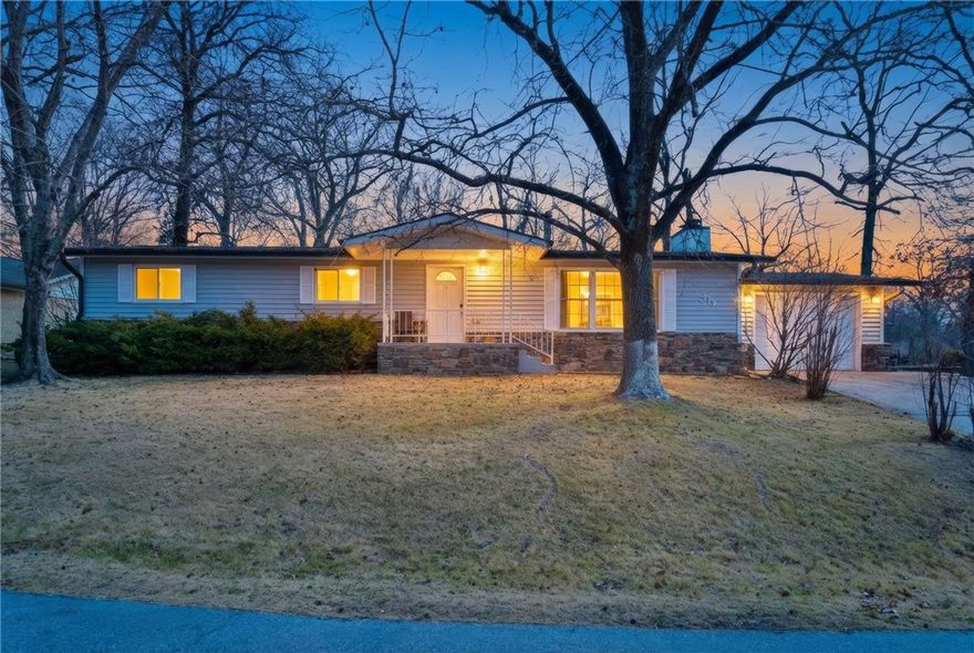 Turnkey Airbnb with proven income — less than 1 mile to Lake Windsor! This fully remodeled 5 bed, 3 bath home is already operating as a successful, profitable short-term rental. Perfect as a primary residence or investment — Bentonville School District. Every major system replaced: roof, dual HVAC, electrical, plumbing, and windows, including the main water line. The main level features an open-concept layout with a quartz-topped kitchen island, stainless appliances, subway tile backsplash, and barn door pantry. Master suite includes a walk-in closet and tiled walk-in shower with glass enclosure. The lower level is a guest favorite — two bedrooms with new safety egress windows, a full bath, a game room with fireplace, and a spacious living area. Neither fireplace has ever been used while we've owned the home. Epoxy and sealed concrete floors keep lower-level maintenance simple. Fenced, level backyard with deck. Home may be sold furnished if desired — some personal items will be removed during the sale process.