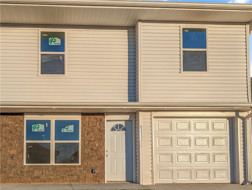 Welcome To Your Next Home! Townhouse With Fenced Yard, Patio Area, One Car Attached Garage, Fridge & Washer/Dryer Included (not pictured). Main Level Open Living Area, Dining, Kitchen, 1/2 Bath. Head Up To Find The Primary Suite w/ Full Attached Bath, 2 Secondary Bedrooms, Full Hall Bath, Laundry Room. Background And Credit Check Required.
