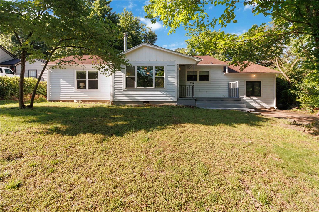 Charming and updated 3-bedroom, 2-bath home located on the desirable west side of Mt Sequoyah. This well-maintained property features beautiful all-wood flooring throughout and has seen a number of recent upgrades, including a new hot water heater, gutters, and replaced downspouts. A special drainage system has been professionally installed for added peace of mind. The kitchen and bathrooms feature replaced tile flooring, along with new plumbing and light fixtures. The home also includes a brand-new dishwasher, oven, and refrigerator—making it truly move-in ready. The bonus room can be used as a playroom, living room, or extra bedroom. Don’t miss this opportunity to own a thoughtfully updated home in a prime location close to trails, parks, and downtown amenities