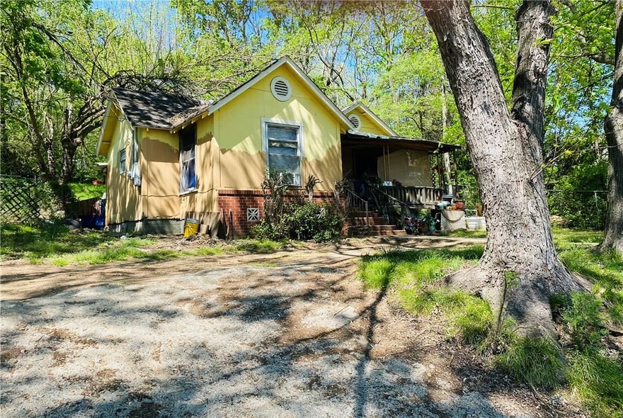 This is a fixer upper with much work to be done. Home being sold "as is" condition. No disclosure or termite certificate will be provided. Buyer should complete their due diligence prior to submitting a contract to purchase. Better to show after 1 PM. No lock box.