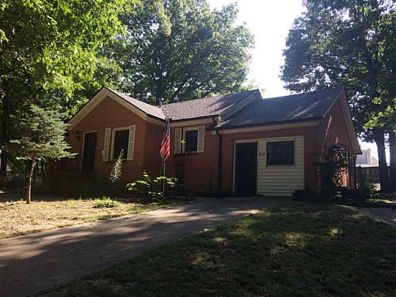 CHARMING DOLL HOUSE. All brick home with 2 living areas, 2 BR and 2 BA. New furnace and air conditioner. Fenced in yard with 2 storage buildings and beautiful mature trees. Close to downtown corridor, Crystal Bridges, in established upscale neighborhood.,Call listing agent