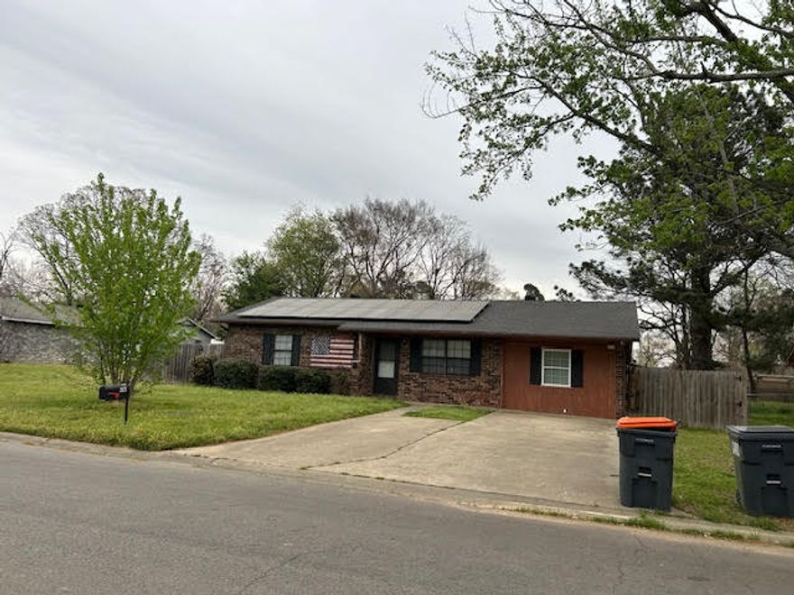 Welcome to this 3 bed, 1 bath home with new flooring, an extra large fenced in back yard with a covered patio, and newly added solar panels that produce a low monthly utility bill. This property is being sold as is.