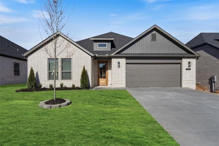 The “IVY” plan features a cozy 3 bed, 2 bath single story open-concept layout with luxurious finishes including vaulted ceilings, quartz countertops, quaint entry way perfect for capturing that inviting feel, upgraded lighting fixtures, custom cabinets, black stainless steel appliances, gas fireplace, gas range, floor to ceiling tiled walk in shower in primary bathroom with whirlpool tub & luxury vinyl plank floors throughout. Enjoy standard inclusions such as insulated garages, full home gutters, privacy fence, & 2” blinds throughout. Community pool coming in Phase 2! Under 10 minutes to XNA Airport and under 20 minutes to Downtown Bentonville and New Walmart Campus! Ask about the additional preferred lender incentive.