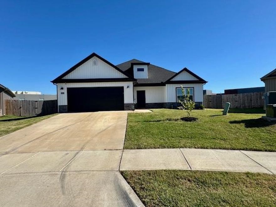 This spacious 4 bedroom, 2 bath home built in 2022 has approx. 1,762 sq ft sitting on a generous 0.33 acre lot in the Barrington Place subdivision located directly behind Bentonville West High School! Smart, open layout, luxury vinyl plank flooring, granite countertops, and split-bedroom floor plan, this residence offers both comfort and style. The primary suite features a walk-in closet and spa-style shower, while the oversized backyard is perfect for entertaining or letting the kids and pets play. Just a short drive to the Wal Mart Home Office and all NW Arkansas has to offer, this home pairs suburban tranquility with prime convenience.