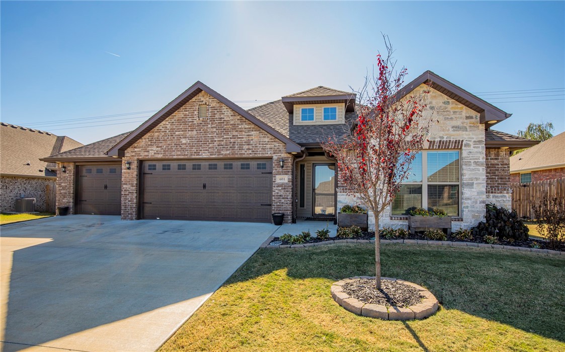 Don't dilly dally to see this immaculate home with inviting curb appeal located in the popular Orchard Park Subdivision. This home features an open floor plan perfect for spending time with your family and friends. Enjoy cold winter nights in front of your fireplace in your spacious living room. The eat-in kitchen has a bar for sitting and enjoying great conversations while preparing meals with your family, guests, or hosting a party. The primary suite boasts a large bathroom with tub, walk in shower, and double sinks plus a walk in closet off of the bathroom. The two guest/kids bedrooms allow plenty of space with nice double door closets. A very special feature of this home is the spacious outdoor living space with your screened in porch to enjoy a relaxing place to read, rest, or simply be refreshed with some alone time or to visit with family and friends while protected from both bugs and weather. The big three car garage can also serve as your workshop area whether working on your bikes or other projects.