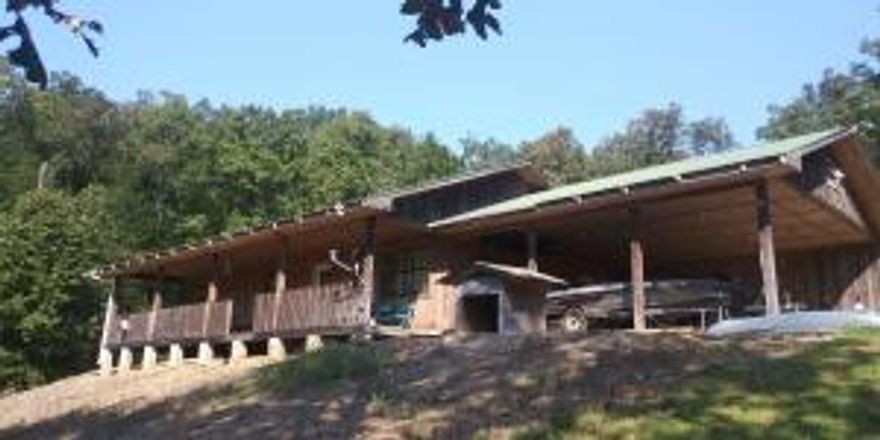 Outdoors-man/Hunters paradise. Borders National Forest and minutes away from Piney Creek, Twin Bridges and Moore Outdoors. This Country house is located on a dead end road. Plenty of wildlife. New well pump and pressure tank installed in 2019. New Heating and air inside and out, range and dishwasher in 2018. House also has a propane heat as a back up source to heat pump.