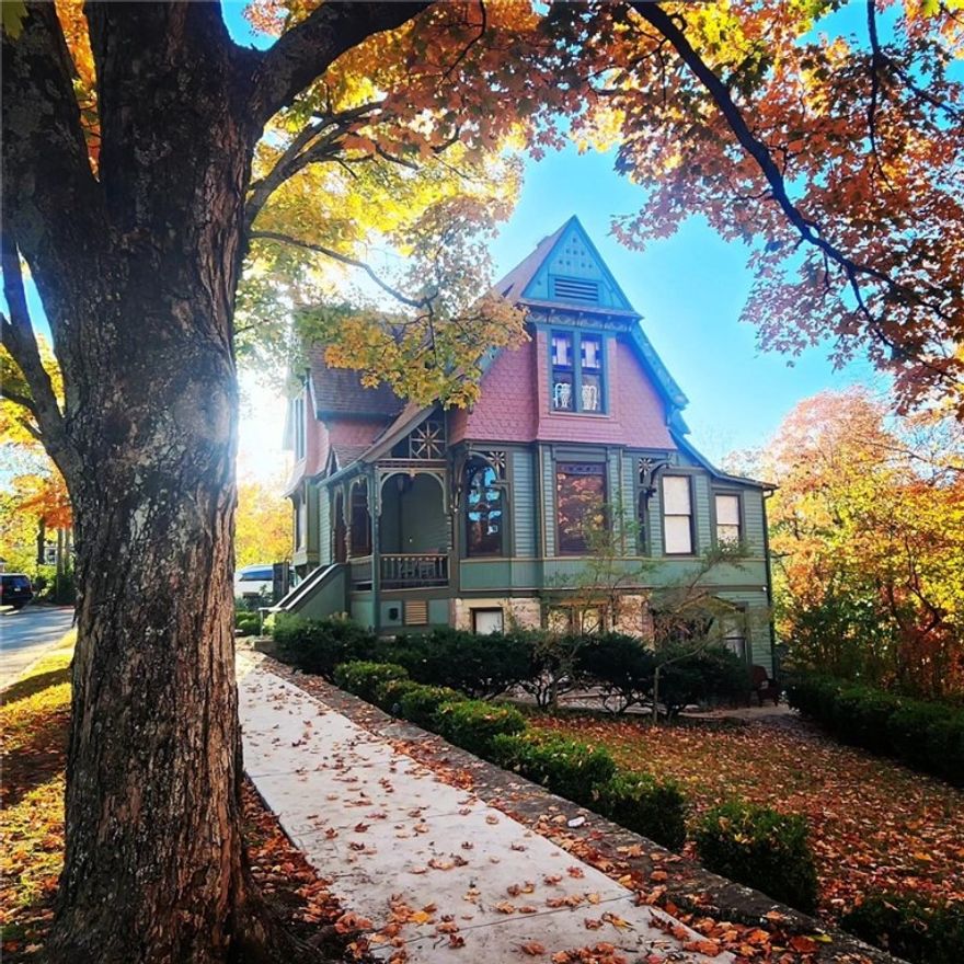 This iconic 1886 Victorian, adjacent to the Crescent Hotel in Eureka Springs, offers 3,429 sq.ft. of restored charm and modern updates. It hosts three bedrooms, three baths, multiple bonus rooms, detached garage, 2 kitchens, and restored original wood floors. It has many new improvements including roof, HVAC, insulation, paint, hot water heaters, kitchen cabinets, showers, tub, and more. A short walk to downtown yet peacefully situated on the historic loop, this property has so many possibilities. It’s currently split into three apartments, including two short-term rentals with their own private entrances. Lower level apartment would be great for a MIL suite or monthly rental. At one time, it housed a small cafe and tea room. Zoned commercial, it is ideal for residential or commercial use.