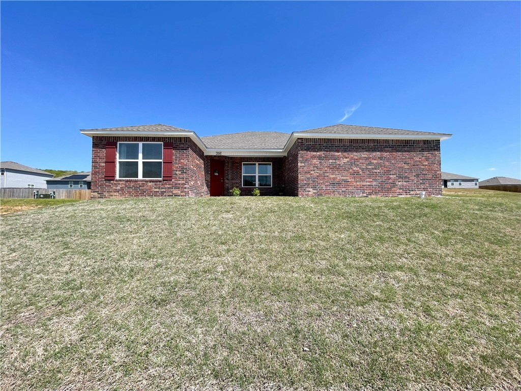 This nearly new 4 bedroom, 2 bathroom home is located in a tranquil, country setting just minutes from Highway 412 giving you easy access to everything you need nearby. This well maintained home sits on an oversized corner lot with a side loading garage. The open floor plan gives you plenty of room to entertain and interact with friends and family. The oversized master bedroom is a homeowner's dream. The home contains beautiful, low maintenance vinyl plank flooring throughout the living room, kitchen, and master bedroom and updated light fixtures throughout. Make this charming, yet affordable home yours today!